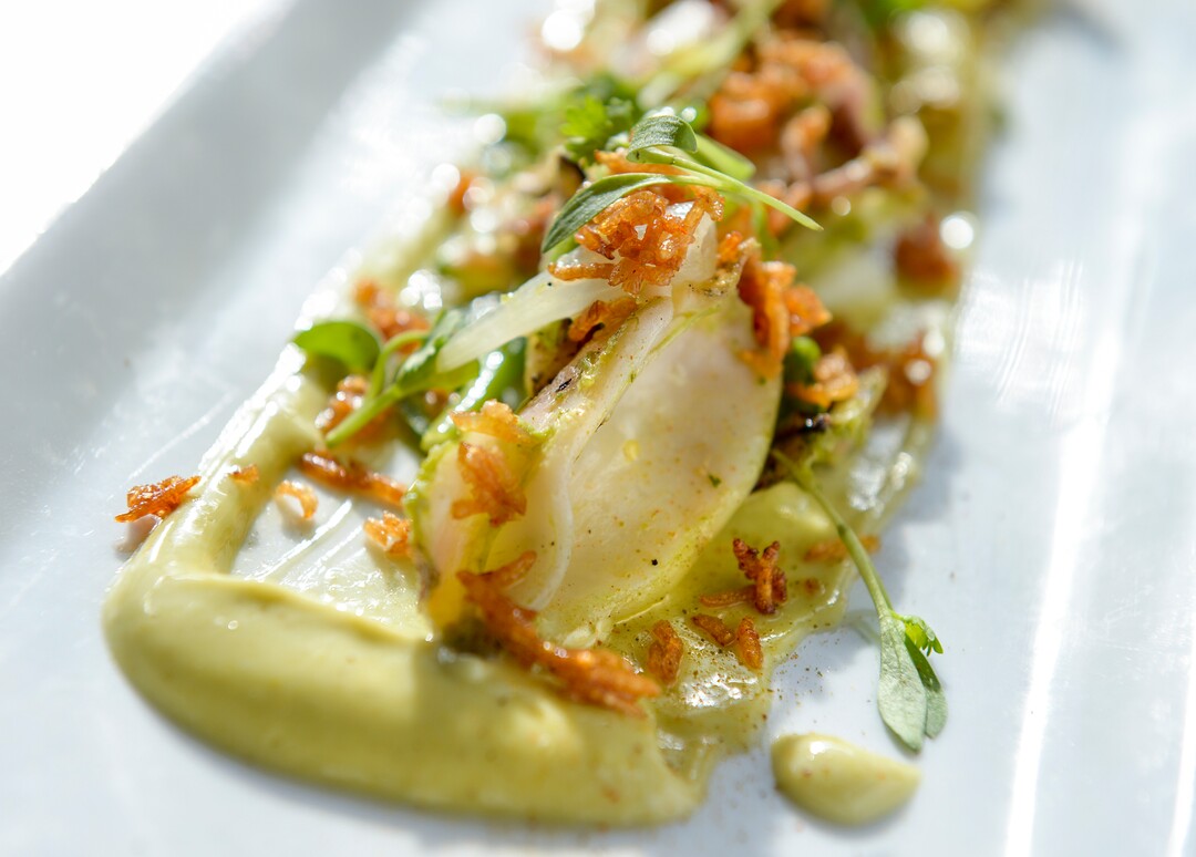 Leah Hogsten  |  The Salt Lake Tribune  SLC Eatery's calamari served with crispy rice, cilantro aoili, tajin and jalapeno, $11. SLC Eatery's regular menu and the cart offerings include globally inspired flavors of Latin America, the Mediterranean and Asia.