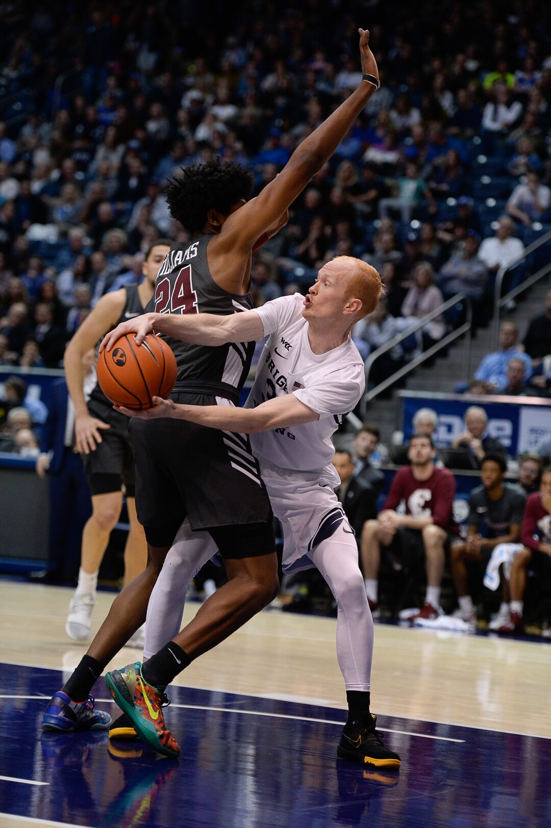 (Francisco Kjolseth  |  The Salt Lake Tribune) Brigham Young Cougars guard TJ Haws (30) looks for an opening past Santa Clara Broncos guard Jalen Williams (24) in the first half as the Brigham Young Cougars host the Santa Clara Broncos at the Marriott Center in Provo, Thursday, Feb. 20, 2020.