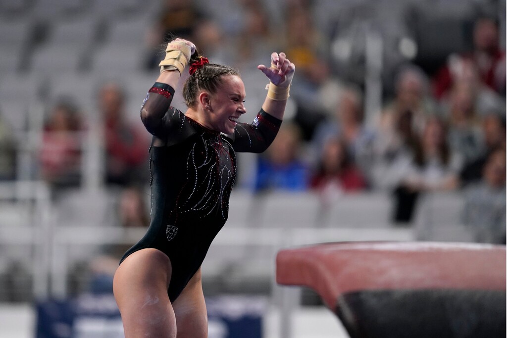 (Tony Gutierrez | AP) Utah's Maile O'Keefe celebrates after competing on the vault during the NCAA women's gymnastics championships, Thursday, April 14, 2022, in Fort Worth, Texas.