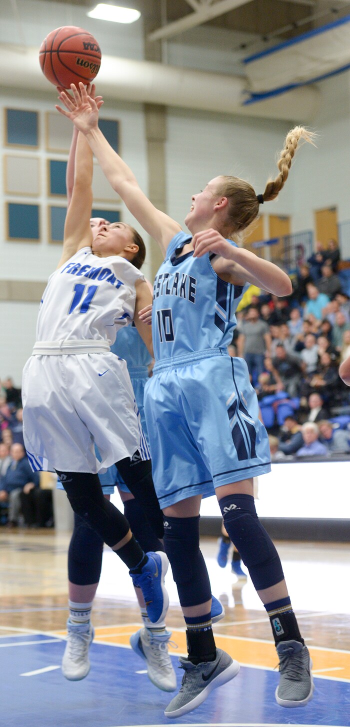 (Leah Hogsten  |  The Salt Lake Tribune) Fremont's Karlie Valdez (11)pulls in the rebound.  Fremont defeated Westlake 54-50 in their semifinal game of the 6A High School Girls' Basketball Tournament at SLCC in Taylorsville, Friday, Feb. 23, 2018. 