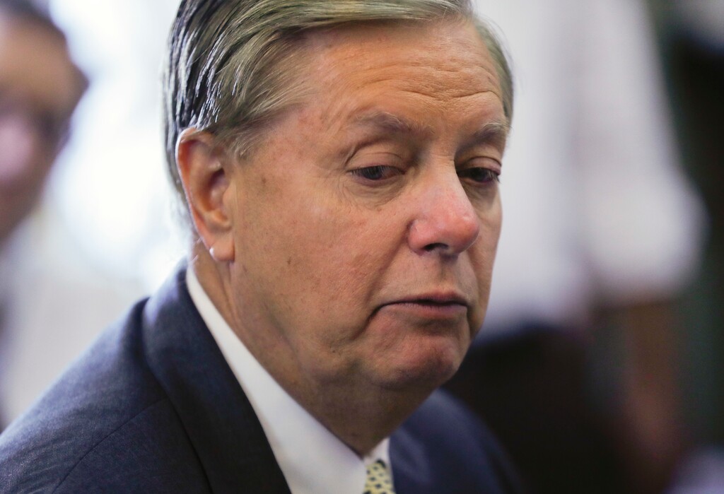 Sen. Lindsey Graham, R-S.C., speaks to members of the media about Sen. John McCain, R-Ariz., on Capitol Hill in Washington, Tuesday, Aug. 28, 2018. (AP Photo/Pablo Martinez Monsivais)