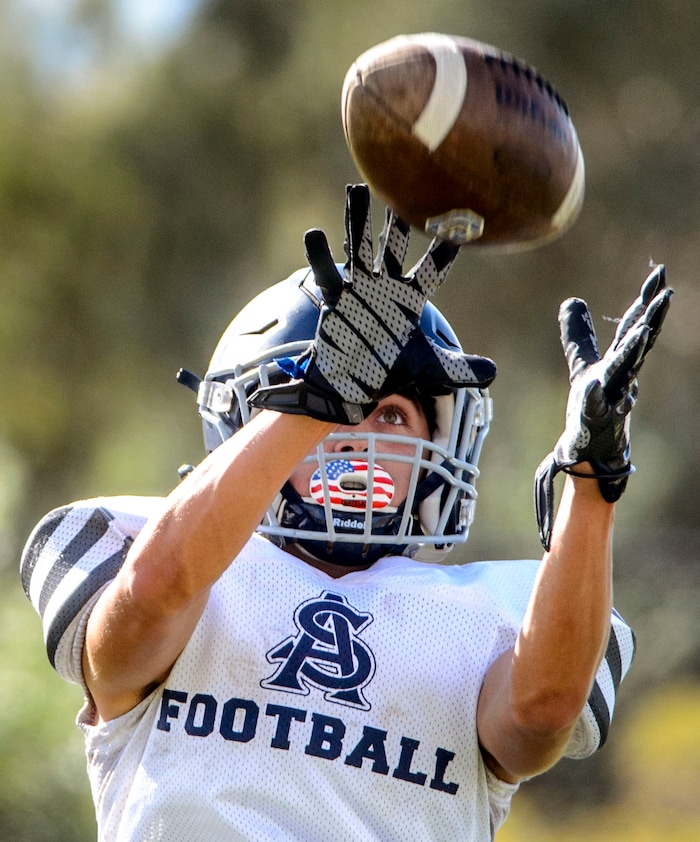 (Steve Griffin  |  The Salt Lake Tribune)  Summit Academy's Gavin Davey practices on the school's football field in Bluffdale, Utah Wednesday September 13, 2017.