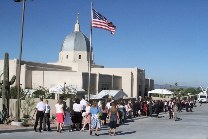 ( Courtesy photo | The Church of Jesus Christ of the Latter-day Saints) Mormons are ushered in to the new temple.