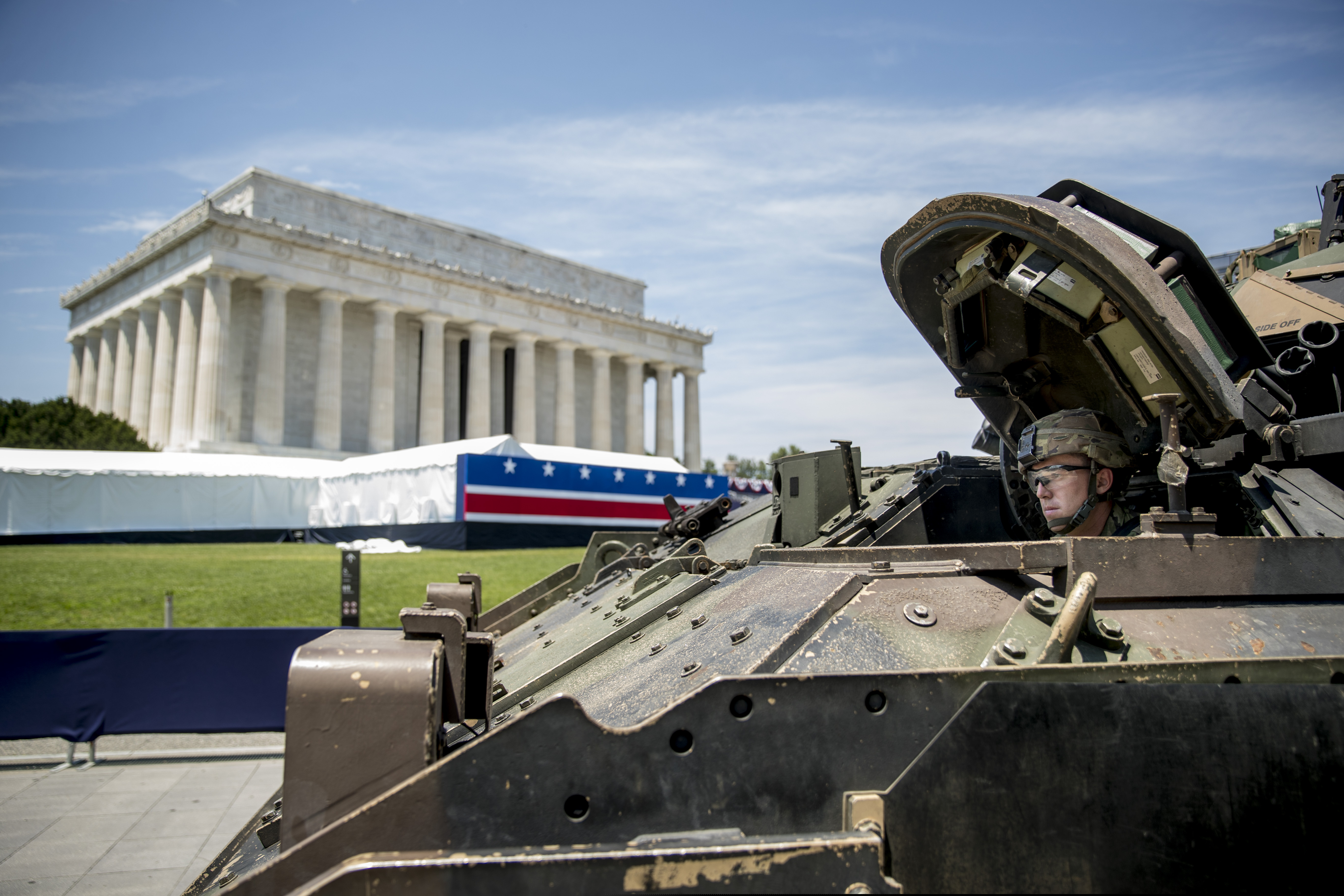 One of two Bradley Fighting Vehicles waits to be driven into place in front of the Lincoln Memorial for President Donald Trump's 'Salute to America' event honoring service branches on Independence Day, Tuesday, July 2, 2019, in Washington. President Donald Trump is promising military tanks along with "Incredible Flyovers & biggest ever Fireworks!" for the Fourth of July. (AP Photo/Andrew Harnik)