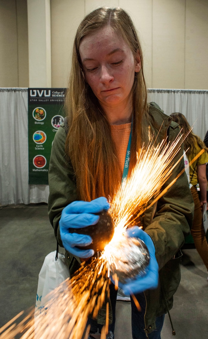 (Rick Egan  |  The Salt Lake Tribune)         Jannie Dena from Wasatch High, makes sparks during at experiment at the SheTech Explorer Day event, at the Mountain America Expo Center in Sandy, Tuesday, April 9, 2019.