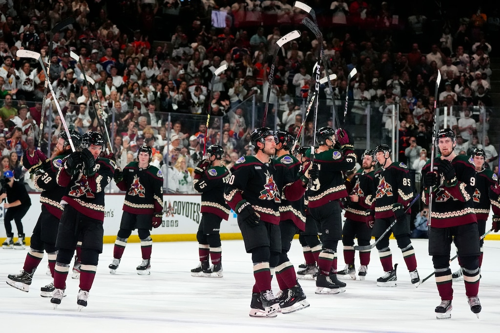 (Ross D. Franklin | AP) Arizona Coyotes players acknowledge the fans after an NHL hockey game against the Edmonton Oilers on Wednesday, April 17, 2024, in Tempe, Ariz. The Coyotes won 5-2. The NHL on Thursday announced the team will move to Salt Lake City next season.