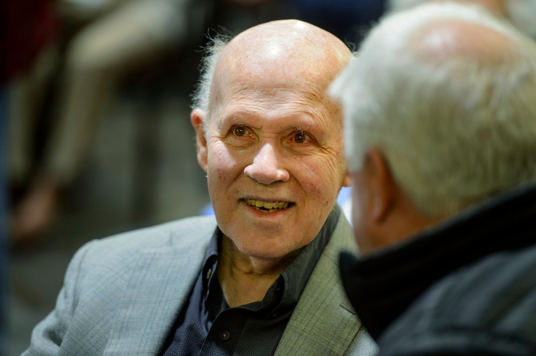(Steve Griffin  |  The Salt Lake Tribune) Paul Christensen  listens as the Salt Lake Education Foundation presents a new scholarship in his honor during a Christmas concert at Cottonwood Place senior living community in Holladay Friday December 15, 2017. For 30 years, Christensen inspired generations of students at Highland High School to pursue their musical talents as the lively choral director of the schoolÕs many music programs.