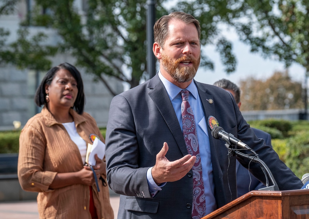 (Leah Hogsten  |  The Salt Lake Tribune)  Rep. Sandra Hollins, D-Salt Lake City, who persuaded lawmakers to unanimously approve putting Amendment C on the ballot listens as Senate sponsor, Sen. Jake Andergg, R-Lehi, tells the crowd he was "shocked" that the Utah constitution still contained words banning slavery "except as a punishment for crime, whereof the party shall have been duly convicted" on Tuesday.  A coalition of politicians, religious leaders and civil rights activists are urged Utahns to pass Amendment C on the ballot to remove old wording in the state constitution, Sept. 22, 2020, that they say still allows slavery as a punishment for crime.