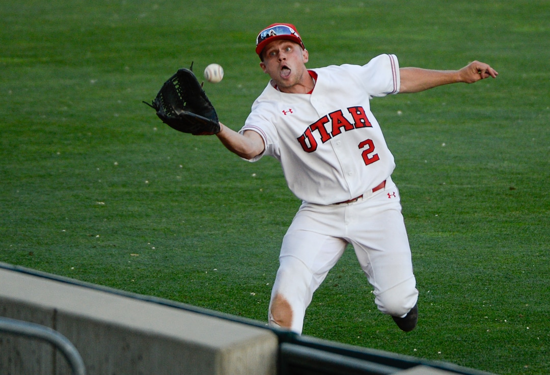 (Francisco Kjolseth  |  The Salt Lake Tribune)  Tyler Thompson hustles for a ball as Utah and BYU renew their rivalry on the baseball diamond as they battle it out at Smith's Ballpark in Salt Lake City on Tuesday, May 14, 2019.