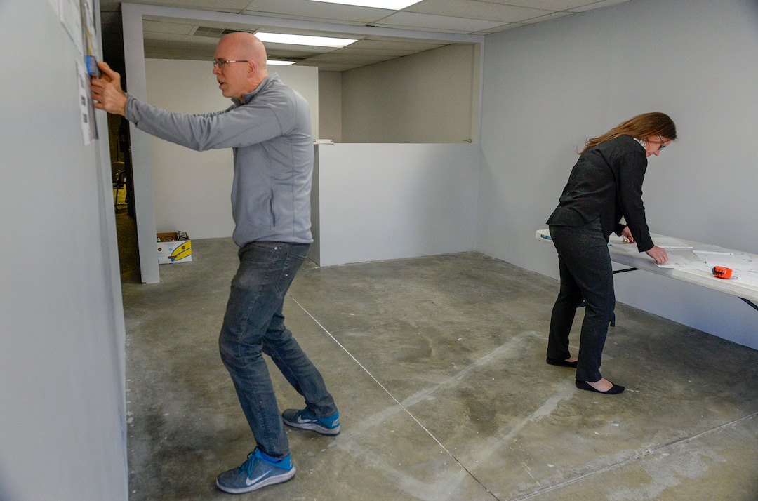 Leah Hogsten  |  The Salt Lake Tribune  Salt Lake City liquor attorney Tanner Lenart and Nox Contemporary art gallery owner John Sproul tack the ill-fated artistic memorials of Utah’s now-defunct liquor law on the walls of Sproul's gallery. The opening reception for the installation is Friday, Nov. 16, and runs thru the end of November. Last May, the state law requiring restaurants and bars to display DABC signs labeling themselves as a “bar” or a “restaurant” was repealed. Once a perceived nuisance by restaurateurs, the signs are celebrated art. The installation "This Is Art, Not a Sign" is a collage made of "This Is a Restaurant, Not a Bar" liquor signs that were once required in Utah restaurants.