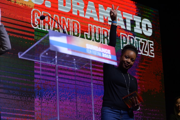 Leah Hogsten  |  The Salt Lake Tribune   Director Chinonye Chukwu accepts the Sundance U.S. Grand Jury Prize for Dramatic for her film Clemency, during the awards ceremony for the 2019 Sundance Film Festival at the Basin Fieldhouse in Park City, Feb. 2, 2019. 