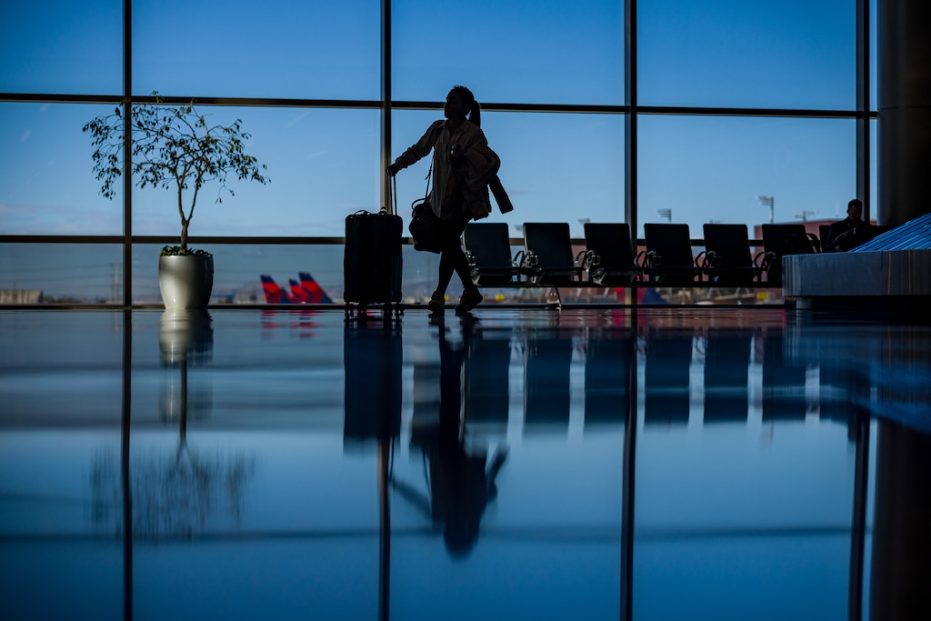 (Trent Nelson | The Salt Lake Tribune) A traveler at Salt Lake City International Airport on Thursday, Nov. 6, 2025.