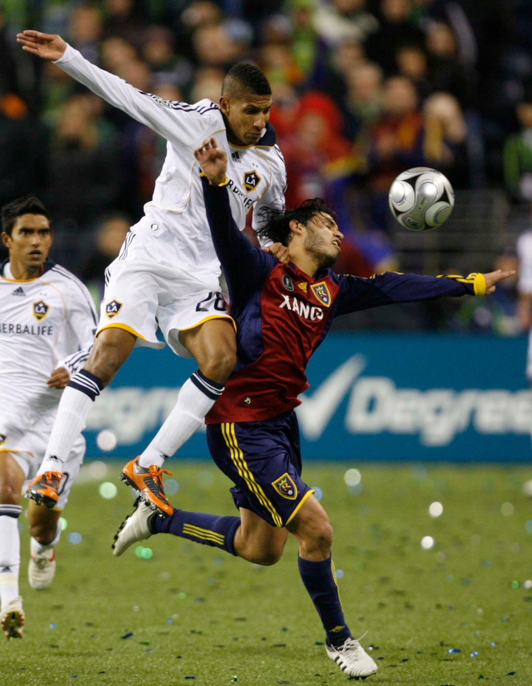 (Trent Nelson  |  Tribune file photo) L.A. Galaxy's Sean Franklin and Real Salt Lake forward Fabian Espindola (16) play during the MLS Cup on Sunday. RSL won the cup 5-4 during the penalty round.