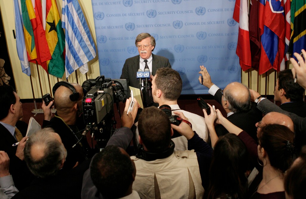 FILE - In this Dec. 6, 2006, file photo, then-United States Ambassador to the United Nations John Bolton speaks to the media before a Security Council meeting at United Nations Headquarters. President Donald Trump’s favorite TV network is increasingly serving as a West Wing casting couch, as the president reshapes his administration with camera-ready personalities. Trump’s new national security adviser,Bolton, is a former U.N. ambassador, a White House veteran _ and perhaps most importantly, a Fox News Channel talking head.  (AP Photo/Seth Wenig)
