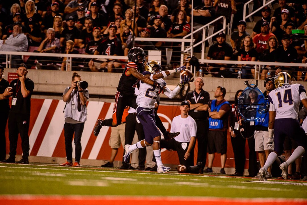 (Trent Nelson | The Salt Lake Tribune)  Washington Huskies defensive back Jordan Miller (23) intercepts the ball with seconds left in the first half as the University of Utah hosts Washington at Rice-Eccles Stadium in Salt Lake City, Saturday Sept. 15, 2018.