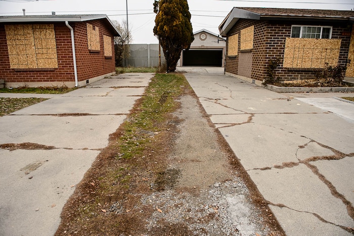 (Trent Nelson | The Salt Lake Tribune)  
UDOT is buying 49 homes in Midvale to widen I-15, and 24 are vacant. The neighborhood is having trouble with homeless people breaking in and trying to squat there. UDOT promises to start demolition next week. Tuesday Dec. 11, 2018.