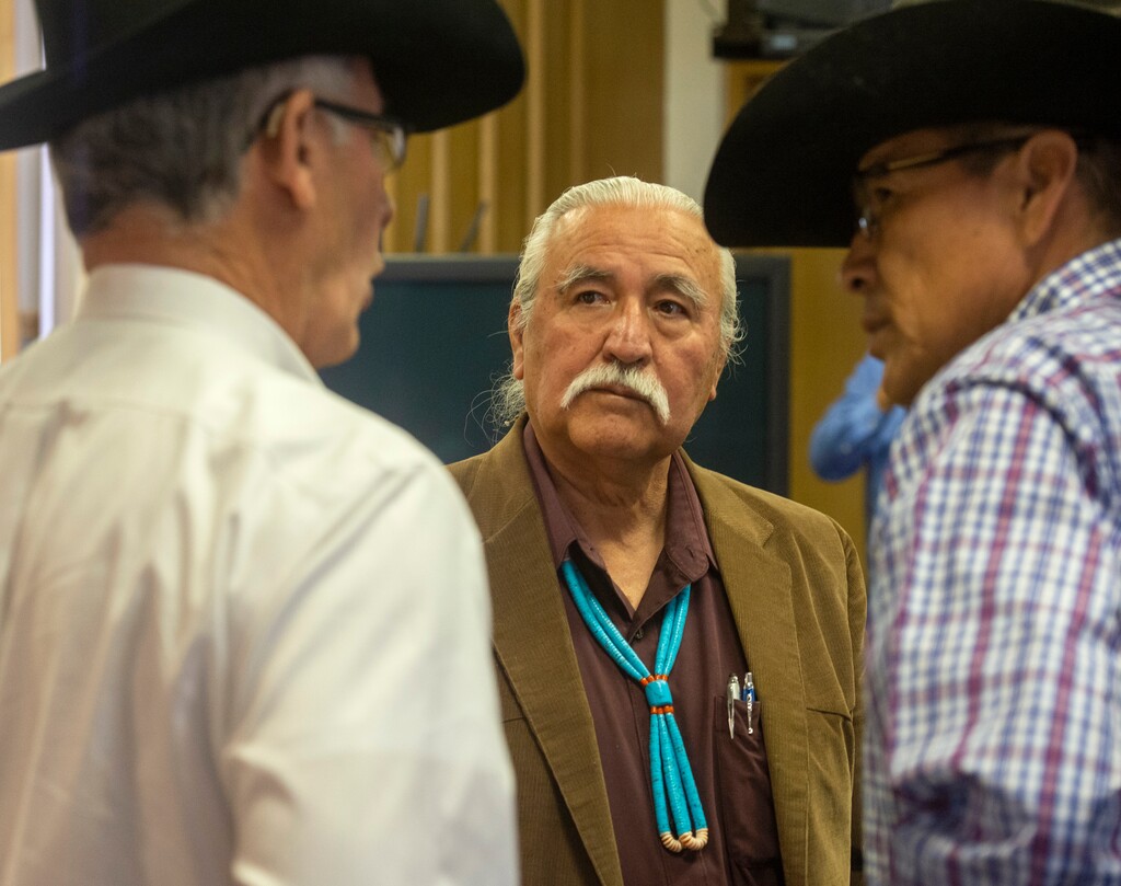 (Rick Egan | Tribune file photo) Newly sworn in San Juan County Commissioners, Bruce Adams, left, Willie Grayeyes, center, and Kenneth Maryboy discuss some issues after being sworn in at the San Juan County Courthouse in Monticello, Utah, on Monday, Jan. 7, 2019.