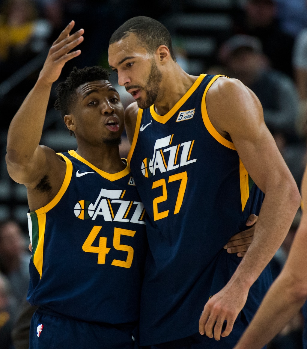 (Rick Egan  |  The Salt Lake Tribune)    Utah Jazz guard Donovan Mitchell chats with Utah Jazz center Rudy Gobert, during a break in the action, in NBA action between the Utah Jazz and the Orlando Magic,  Monday, March 5, 2018.