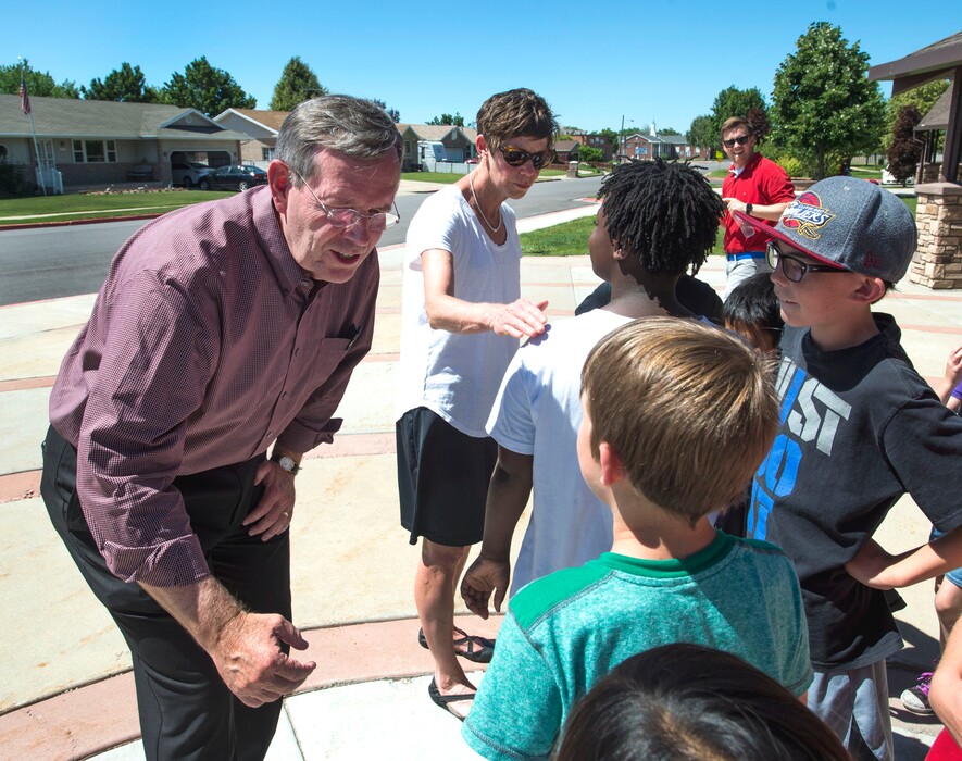 (Steve Griffin | Tribune file photo) Former three-term Gov. Mike Leavitt actively campaigned for several signature-gathering candidates in last year's campaign. He was back on Utah's Capitol Hill on Wednesday to urge House Republicans to unite behind the dual-track nominating system approved in a legislative compromise three years ago.

Former Gov. Mike Leavitt and Weber County Commission candidate Caitlin Gochnour stop to chat with children from the Boys and Girls Clubs of Weber-Davis the as they walk a Roy, Utah neighborhood with local candidates who support Count My Vote election reforms. The group met at the Roy Hillside Senior Citizen Center in Roy, Utah Friday June 17, 2016.