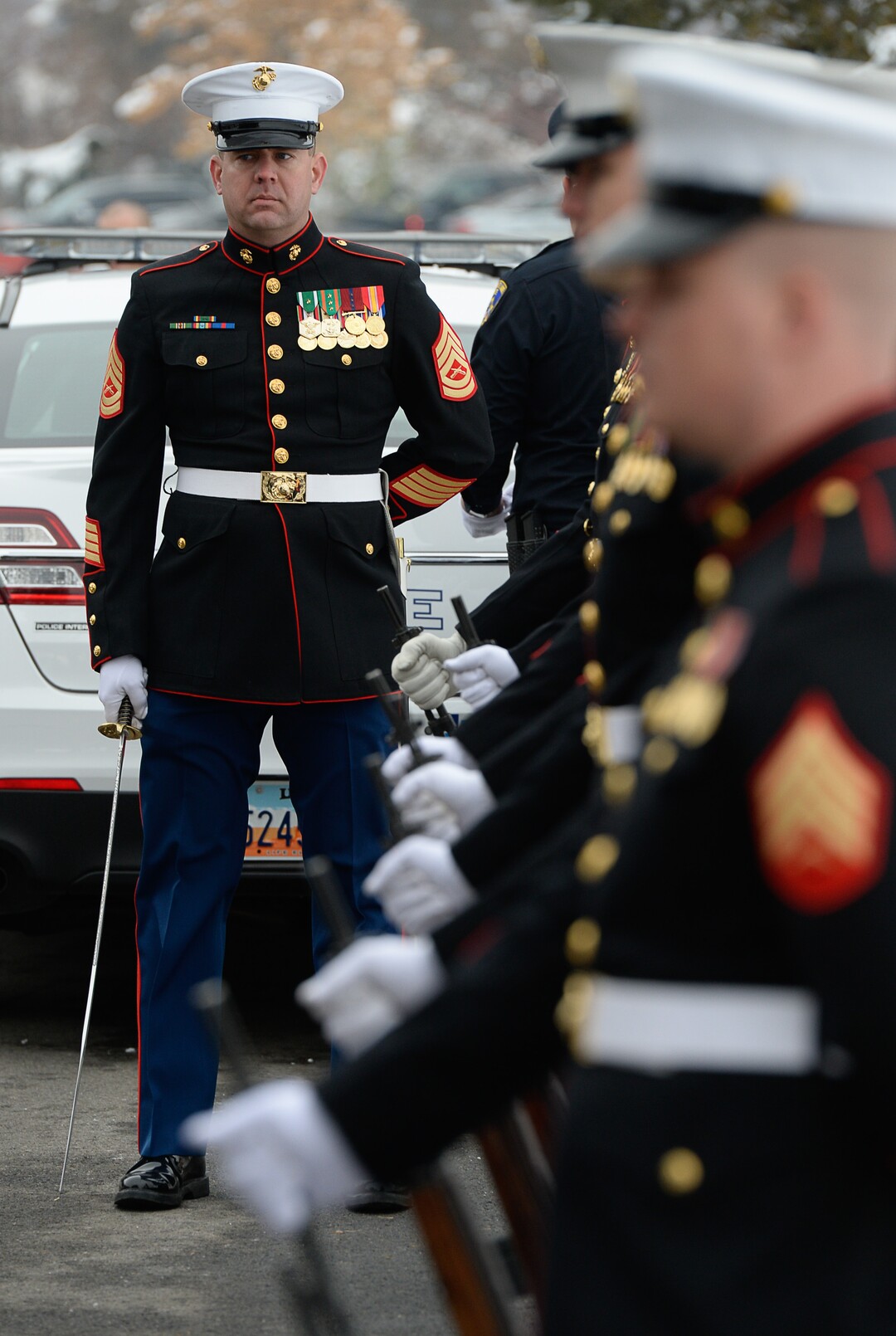 (Francisco Kjolseth  |  The Salt Lake Tribune)  Members of the Marine Corps attend police officer David Romrell's funeral services at Larkin Sunset Gardens Cemetery in Sandy, Wed. Dec. 5, 2018.
