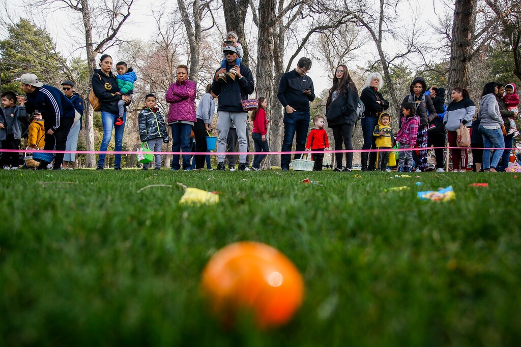 (Nicole Boliaux | For The Tribune) Children and their families wait for the stroke of 9 o'clock to begin the annual Easter egg hunt put on by A Kid's Place Dentistry in Liberty Park in Salt Lake City on Saturday, March 31, 2018.