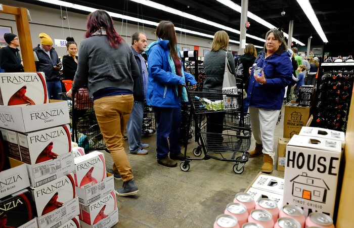 (Francisco Kjolseth | The Salt Lake Tribune) The day before Thanksgiving is the busiest day of the year at Utah's state-run liquor stores, and the store in Cottonwood Heights at 1863 E. Fort Union Blvd., makes the most sales in the state, as long lines form inside the store.