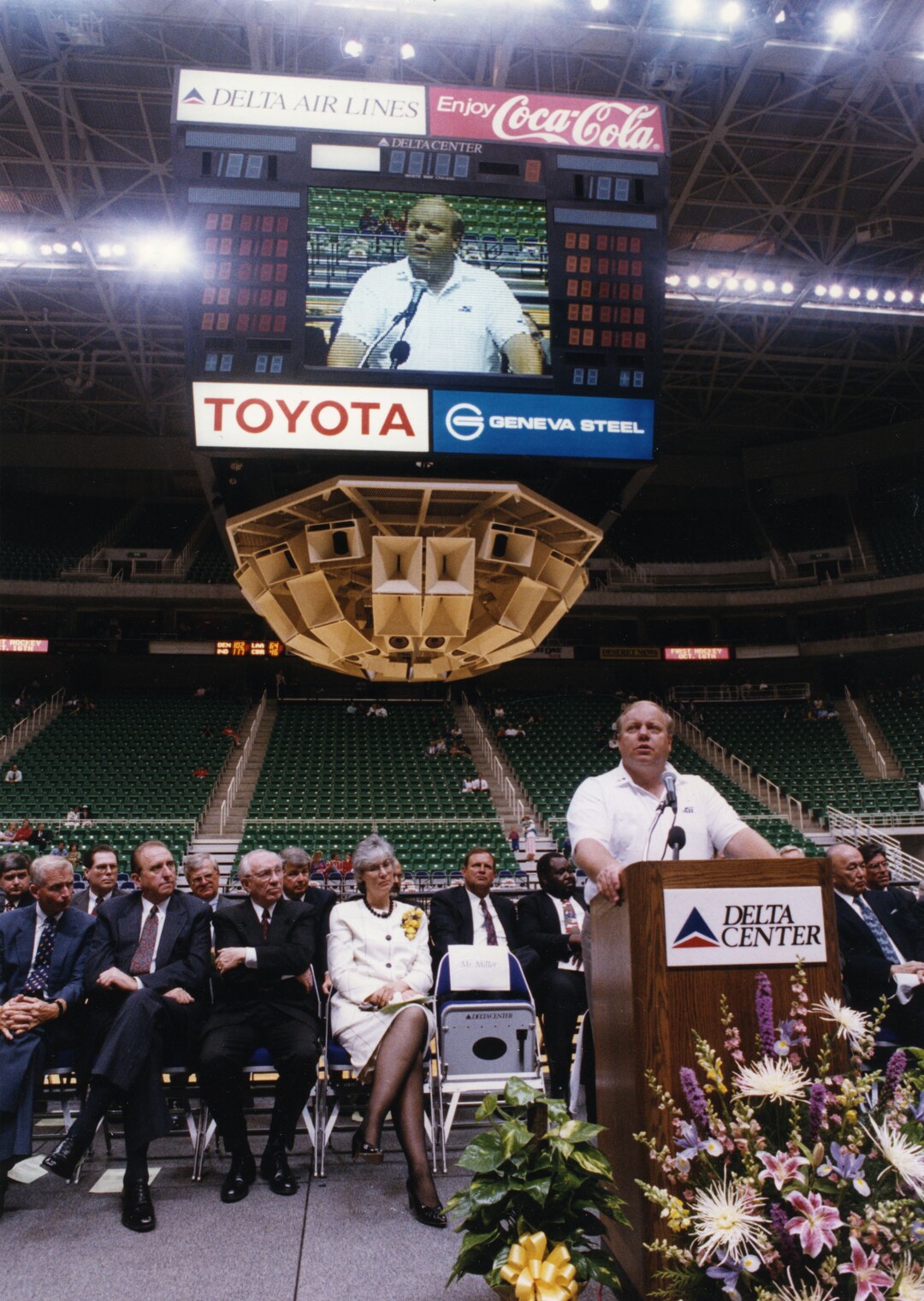 (Tribune file photo) larry Miller speaks at the dedication of the Delta Center.