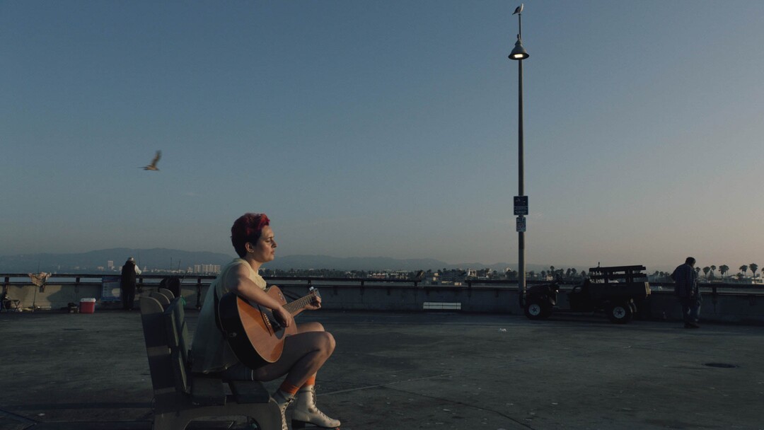 (John Schmidt  |  courtesy of Sundance Institute) Olympia Miccio is one of the 19 Get Lit poets who wrote and perform in "Summertime," directed by Carlos Lopez Estrada, an official selection of the NEXT program at the 2020 Sundance Film Festival.