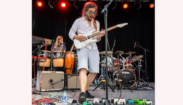 (Rick Egan | The Salt Lake Tribune) Rob Drayna plays guitar for the band "Superbubble" at the Salt Lake Arts Festival, on Saturday, Aug. 28, 2021.