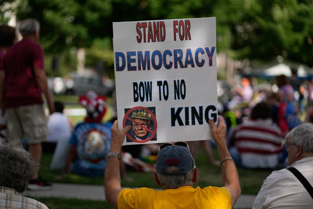 (Francisco Kjolseth  | The Salt Lake Tribune) People gather for a No Kings demonstration in downtown Salt Lake City on Saturday, June 14, 2025.