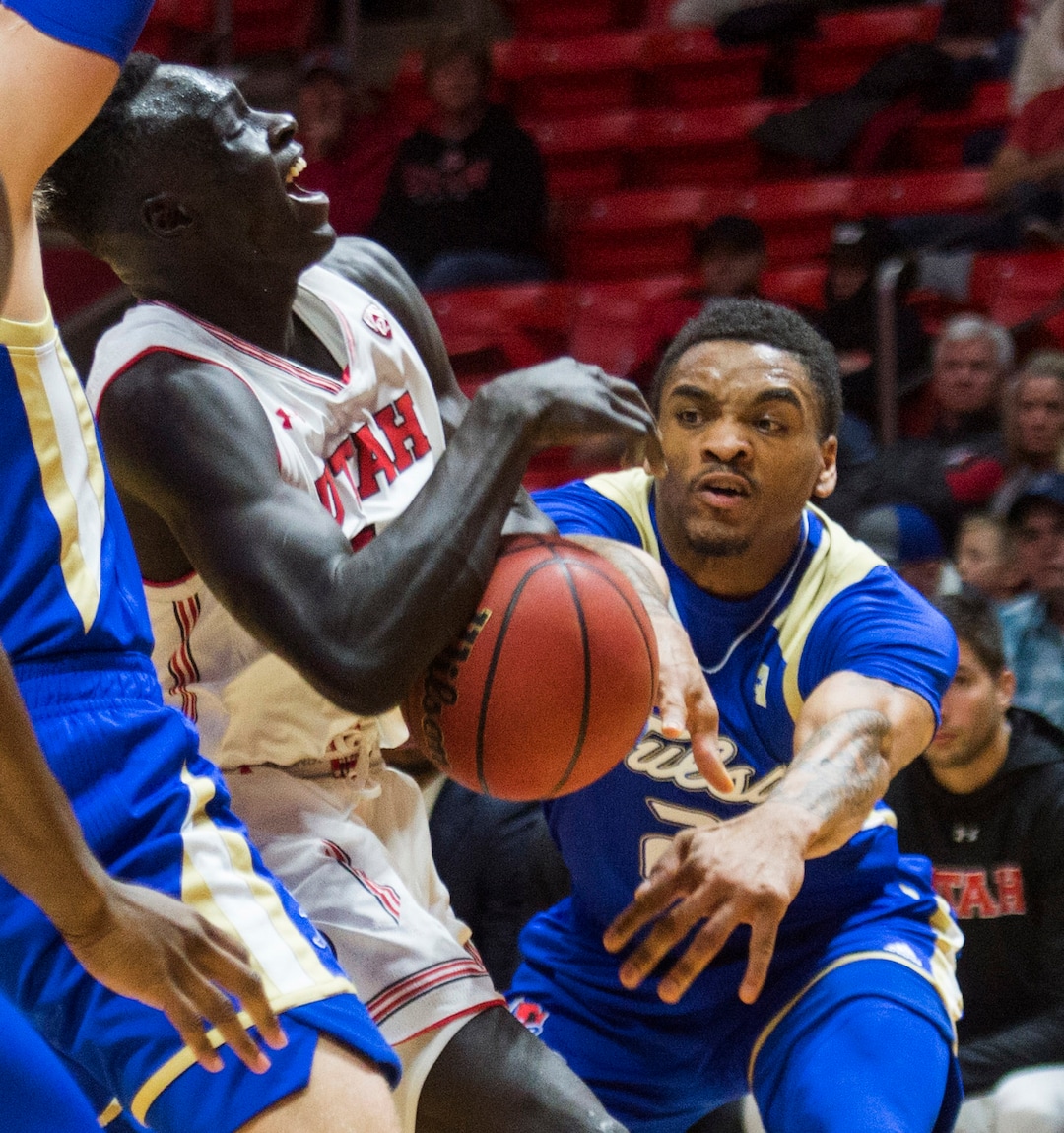 (Rick Egan  |  The Salt Lake Tribune)        Tulsa Golden Hurricane guard DaQuan Jeffries (2) strips the ball from Utah Utes forward Both Gach (11), in basketball action between, Utah Utes and Tulsa Golden Hurricane, at the Jon M. Huntsman Center, Saturday, Dec. 1, 2018.