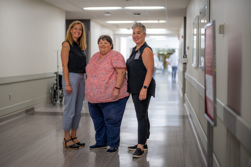 (Trent Nelson | The Salt Lake Tribune) Heather Smith, Susan Gustafson, and Diane McDermaid at the University of Utah Hospital in Salt Lake City on Wednesday, Sept. 7, 2022. Smith is the co-director of the hospital's No One Dies Alone program. Gustafson and McDermaid are volunteers.