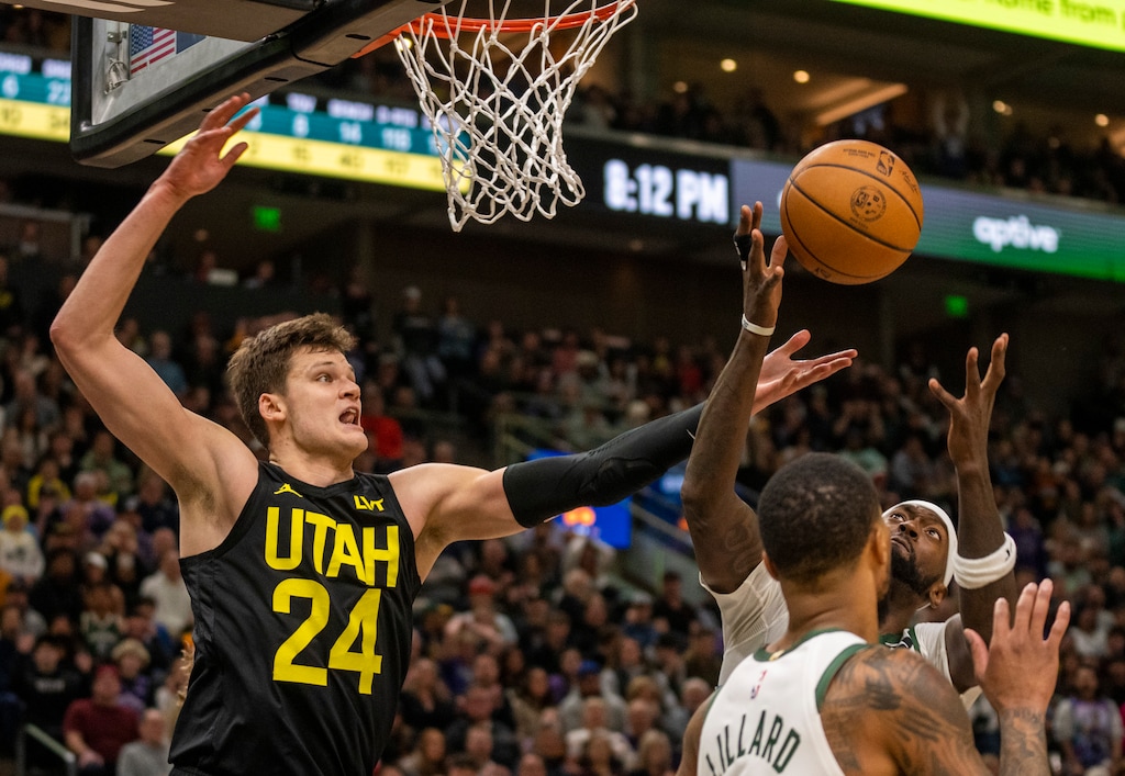 (Rick Egan | The Salt Lake Tribune) 
Utah Jazz center Walker Kessler (24) goes for a rebound, in NBA action between the Utah Jazz and the Milwaukee Bucks, at the Delta Center,   on Sunday, Feb. 4, 2024. Entering his third NBA season, Kessler plans to play in Utah's summer league games this year.