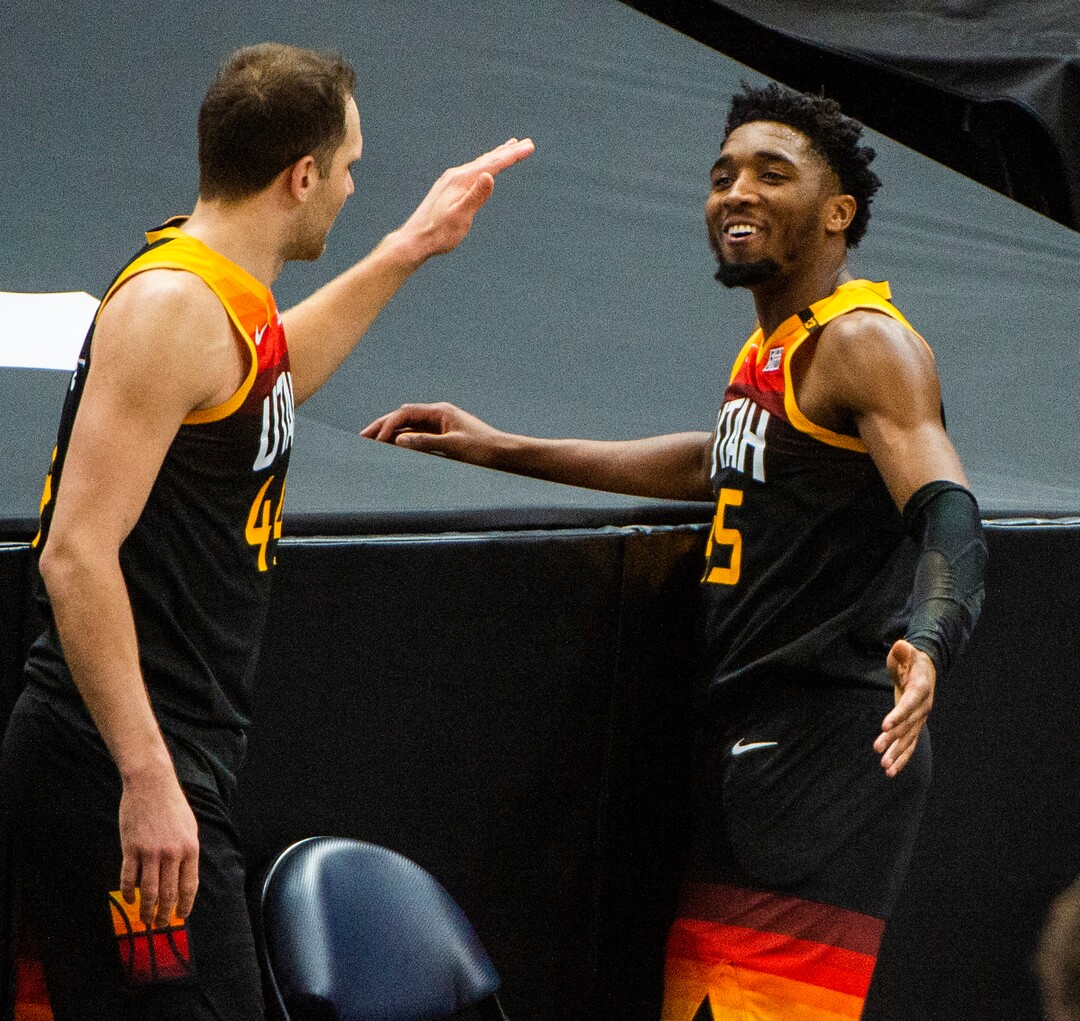 (Rick Egan | The Salt Lake Tribune)  Utah Jazz forward Bojan Bogdanovic (44) and Utah Jazz guard Donovan Mitchell (45) shares a laugh as they both chase a ball out of bounds, in NBA action between the Utah Jazz and the Philadelphia 76ers at Vivint Arena, on Monday, Feb. 15, 2021.