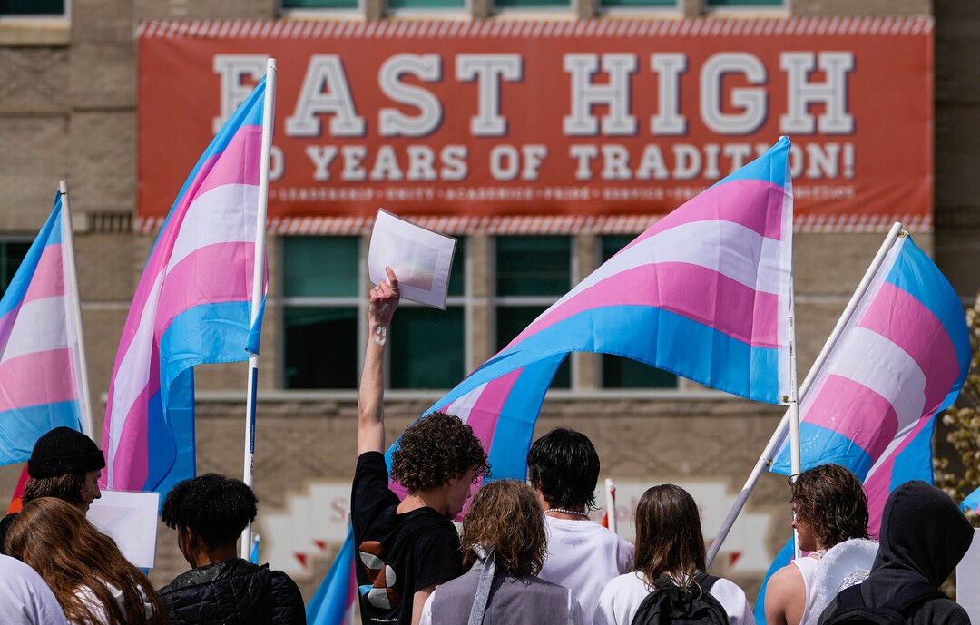 (Francisco Kjolseth | The Salt Lake Tribune) East High school students gather in front of the school during a walkout on Friday, April 15, 2022, to protest HB11, which bans transgender girls from participating in female school sports. 