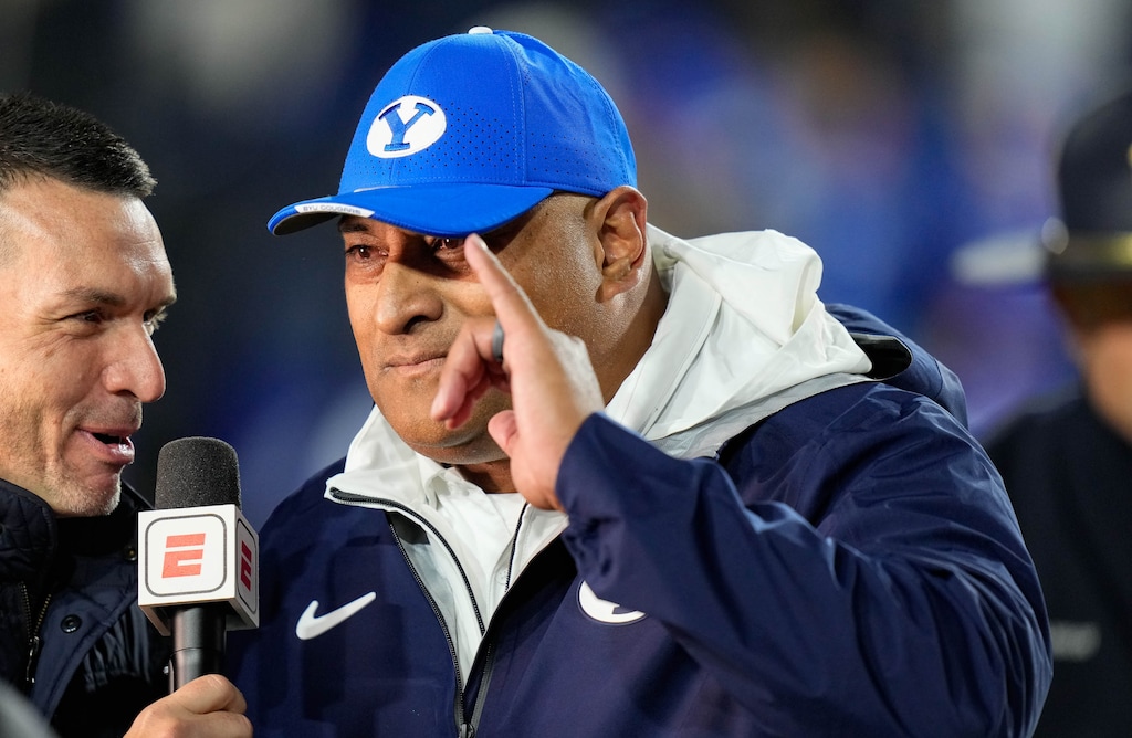 (Francisco Kjolseth  | The Salt Lake Tribune) BYU football coach Kalani Sitake celebrates the teams 38-35 win over the Oklahoma State Cowboys to remain undefeated in Provo on Friday, Oct. 18, 2024.