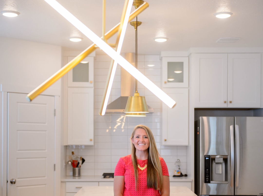(Trent Nelson  |  The Salt Lake Tribune)  
Megan Miller in the kitchen of her energy-efficient home in the Granite Legacy community in South Salt Lake on Tuesday, July 16, 2019. Garbett Homes is behind the project.