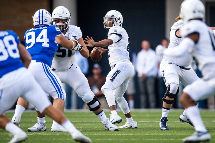 (Chris Detrick  |  The Salt Lake Tribune)  Utah State Aggies quarterback Kent Myers (2) throws the ball during the game at Merlin Olsen Field at Maverik Stadium Friday, September 29, 2017.