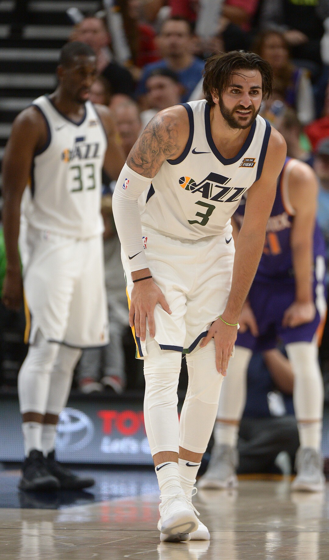 (Leah Hogsten  |  The Salt Lake Tribune)  Utah Jazz guard Ricky Rubio (3) favors his left knee after hitting the deck for a loose ball. The Utah Jazz defeated the Phoenix Suns 112-101 during preseason NBA basketball at Vivint Smart Home Arena in Salt Lake City, October 6, 2017.