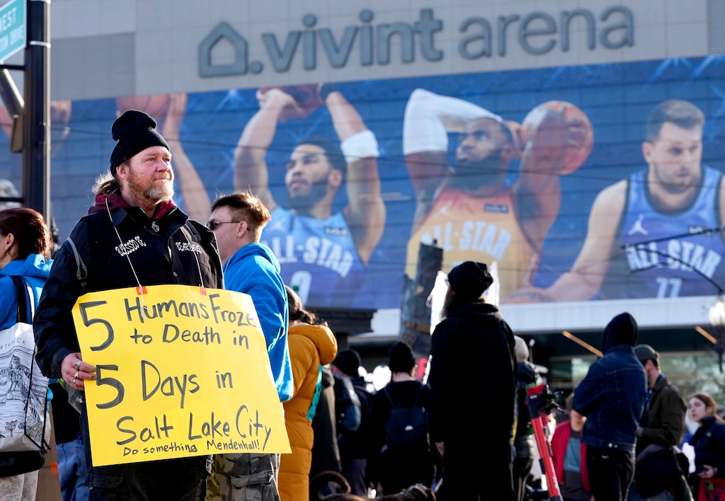 (Francisco Kjolseth | The Salt Lake Tribune) Bear Eagle who has experienced homelessness and expressed no interest in the basketball game, joins other homeless advocates outside of Vivint Smart Home Arena just hours before tip-off for the All-Star game on Sunday, Feb. 19, 2023.