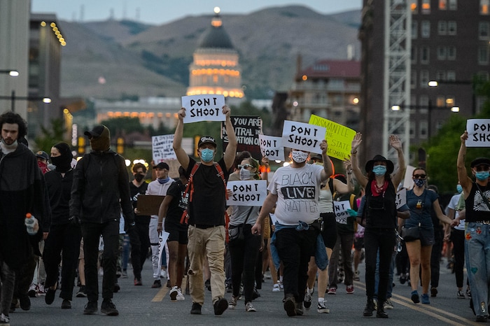 (Trent Nelson  |  The Salt Lake Tribune) Protesters march through Salt Lake City on Monday, June 1, 2020.