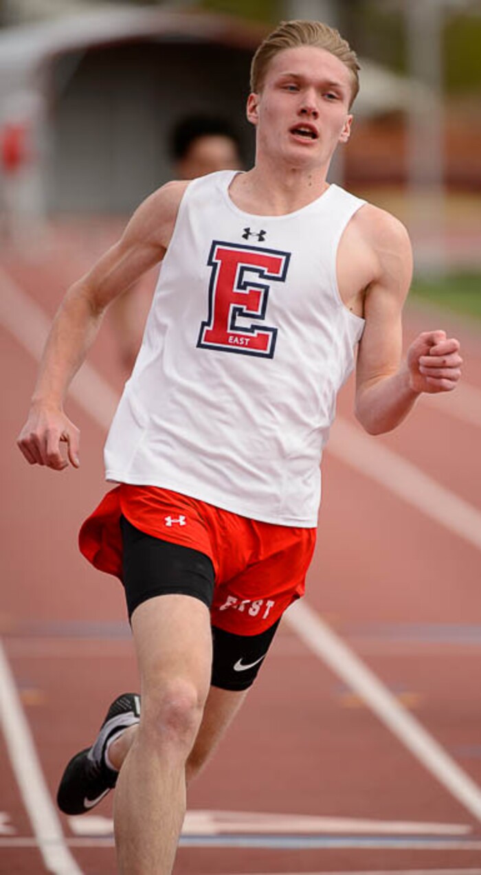 (Trent Nelson | The Salt Lake Tribune)  East track star Will Prettyman, one of the state's best long jumpers and sprinters, competing in the 100m, Thursday April 5, 2018.