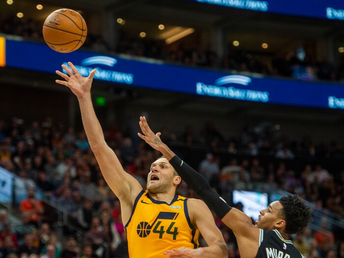(Rick Egan  |  The Salt Lake Tribune)    
Utah Jazz forward Bojan Bogdanovic (44) gets past San Antonio Spurs guard Dejounte Murray (5), in NBA action between the Utah Jazz and the San Antonio Spurs, in Salt Lake City, Friday, Feb. 21, 2020.