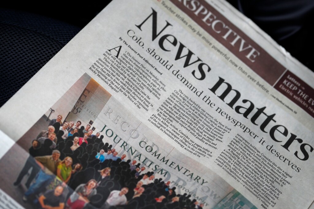 FILE - This April 21, 2018, file photo shows the front page of the Perspective section of The Denver Post from Sunday, April 8, in Denver. The Post's Editorial Page Editor Chuck Plunkett, who oversaw an editorial critical of budget and staff cuts made by the newspaper's New York-based hedge fund owners, said he resigned Thursday, May 3, after management rejected a second editorial lamenting Alden Global Capital’s behavior. (AP Photo/David Zalubowski, File)