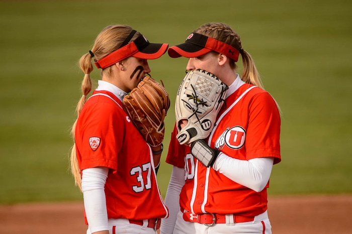 (Trent Nelson | The Salt Lake Tribune)  Utah Utes host the BYU Cougars, NCAA softball in Salt Lake City, Wednesday April 18, 2018. Utah infielder Heather Bowen (37) and Utah starting pitcher Hailey Hilburn (30).