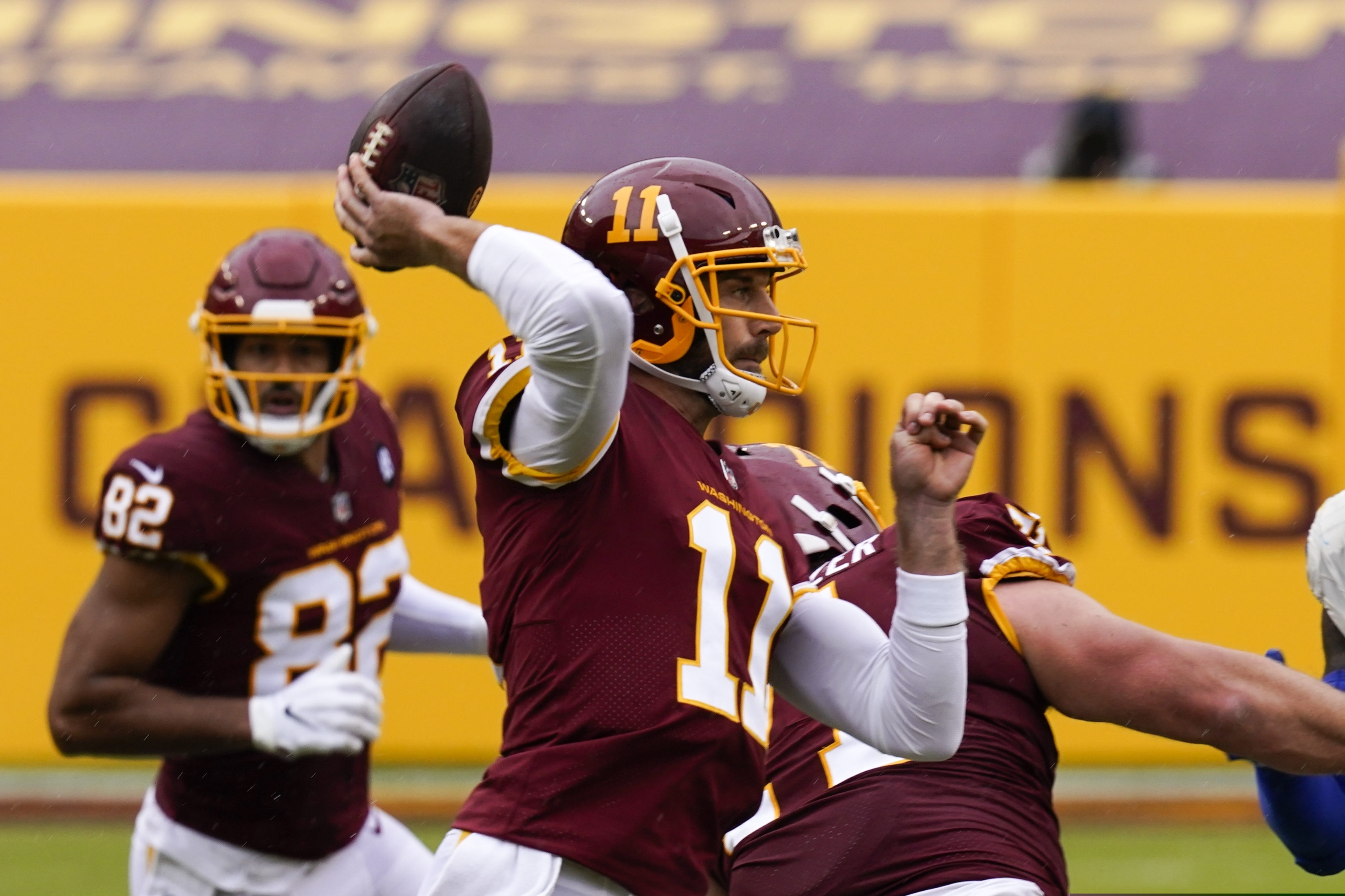 (Steve Helber | The Associated Press) Washington Football Team quarterback Alex Smith throws during the first half of an NFL football game against the Los Angeles Rams Sunday, Oct. 11, 2020, in Landover, Md.