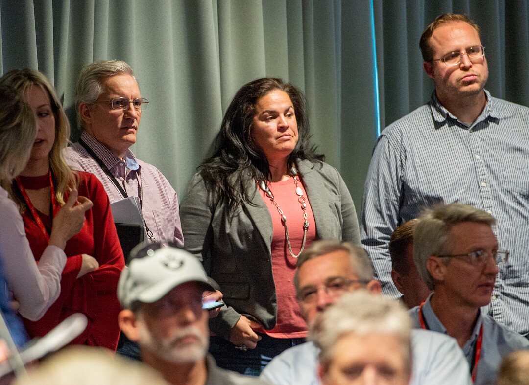 (Leah Hogsten  |  The Salt Lake Tribune)  When the Utah GOP State Central Committee voted to oust members of auxilaries representing several minority groups and women, some members alleged racism. Committee member Carolina Herrin, center, took on one man in the crowd who said the opposition was pulling the race card.  The Utah Republican Party Central Committee meets Saturday, May 19, 2018, to elect a new party vice chairman and debate several potential bylaw changes. 