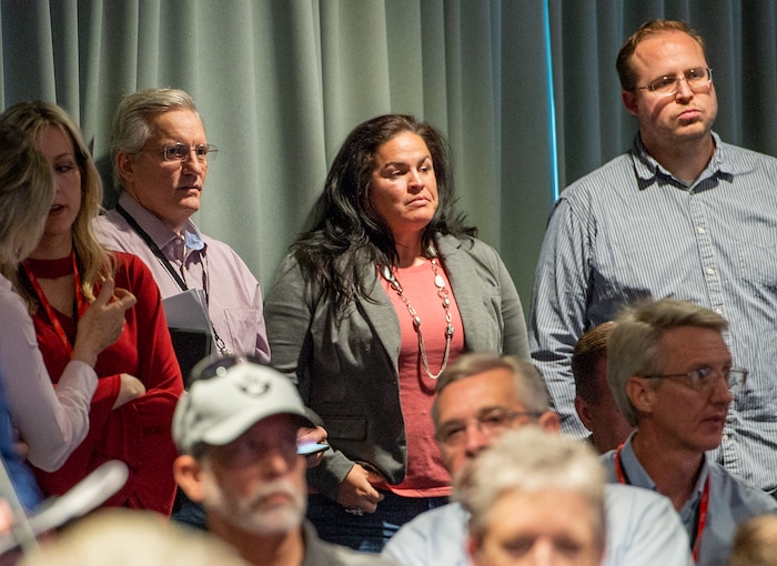 (Leah Hogsten | The Salt Lake Tribune) When the Utah GOP State Central Committee voted to oust members of auxilaries representing several minority groups and women, some members alleged racism. Committee member Carolina Herrin, center, took on one man in the crowd who said the opposition was pulling the race card. The Utah Republican Party Central Committee meets Saturday, May 19, 2018, to elect a new party vice chairman and debate several potential bylaw changes.