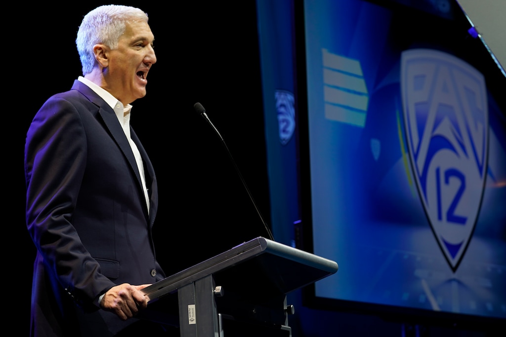 Pac-12 Conference commissioner George Kliavkoff speaks at Pac-12 NCAA college football media day Friday, July 29, 2022, in Los Angeles. (AP Photo/Damian Dovarganes)