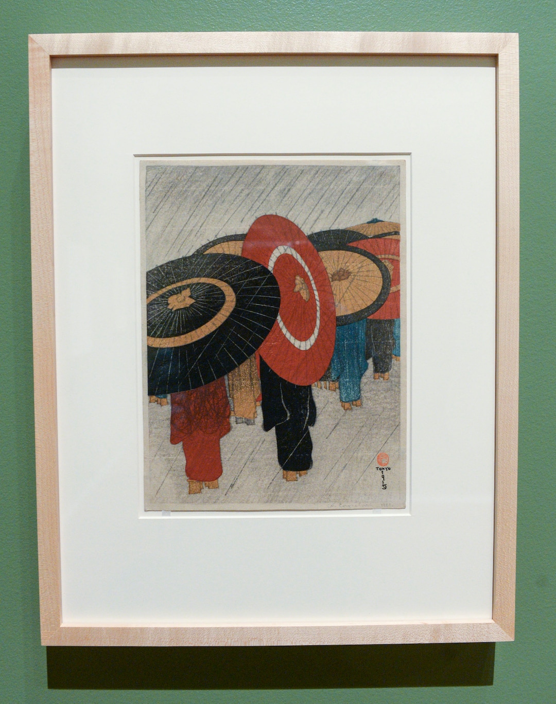(Leah Hogsten  |  The Salt Lake Tribune)  Umbrellas, 1915, woodblock print; ink and color on paper by Friedrich Capelari and publisher Watanabe Shozaburo, marking the beginning of the shin hanga movement.  The Utah Museum of Fine Arts exhibit Beyond the Divide: Merchant, Artist, Samurai in Edo Japan features scrolls, screens, sculpture, prints and samurai armor and weapons from the UMFAÕs own collection.